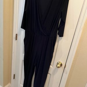 Black spandex jumper.   Missing belt